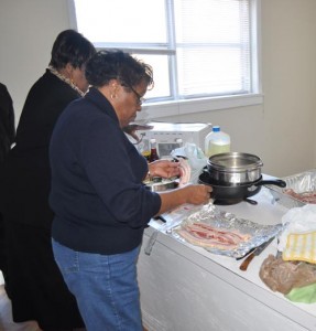 These ladies were preparing a full course breakfast while Rev. Elvin Thompson talked about his research on Black education.