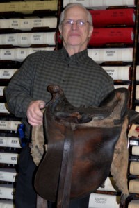 Richard Killen brings a saddle home.