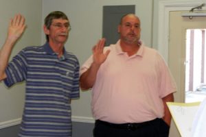 Returning Council members Keith Sexton and Shannon Philpott taking their oaths of office at Trenton’s Town Council meeting, Apr. 10.