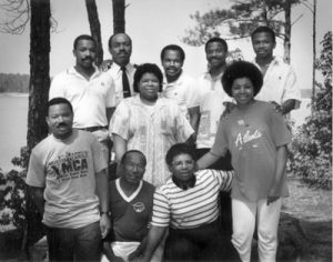 Starting in rear-left: Bruce K. Jackson, Charles B. Jackson, Carl D. Jackson, Toney E. Jackson, E. Scott Jackson, (standing middle) Veronica R. Jackson, (front row) M. Don Jackson, (squatting) Carletha Jackson and Marian Jackson, and (standing) Carletta F. Smith. Photo from "Celebrate '88," immediate family reunion (of Carletha and Marian Jackson off springs) at Hickory Knob State Park, SC in July 1988.
