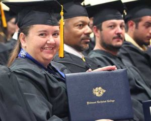 Piedmont Technical College recognized more than 300 students who received certificates, diplomas and associate degrees during spring commencement exercises May 9 at the James Medford Family Event Center. Building construction technology graduate Tara Lindley of Clinton proudly displays her degree.