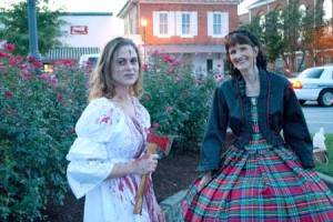 Actress Ashley Hatcher, playing the infamous murderess Becky Cotton, enjoys a brief interlude with the Southern Studies director Tonya Browder.