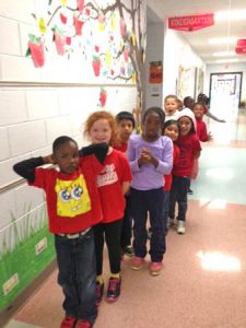 Old Macedonia Baptist Church sponsors the “Lights On” project that these young people are participating in at Douglas Elementary. The after school program is six years old.