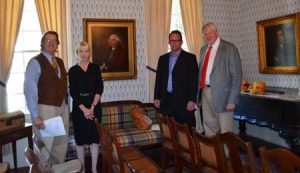 Society President William Morgan Benton, Blocker descendants Amy Geer and Will Geer and Society Historian Bettis C. Rainsford in front of the newly-acquired portraits of John Blocker, Sr. (1749-1814) and John Blocker, Jr. (1778-1836).