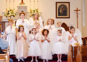 The tour starts at the Catholic Church where last year these angels appeared to help tell the story.