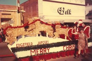 The Jaycees float in a 70s parade.