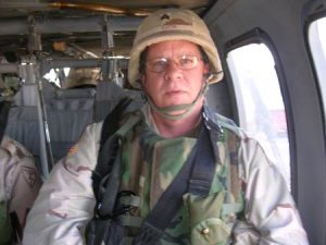 Virgil Huston on a Blackhawk helicopter going to Baghdad in March, 2005.