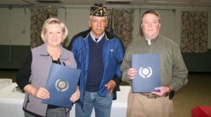 Left to right:  Penny Hunt, Commander Mario Luna and Kenneth Davis