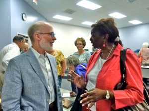 Leonard Todd, a presenter at the 2013 Southern Studies, talks with one of the attendees.