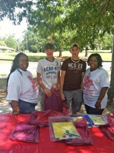 Hunter and Nick came out to support the Alumni school supplies give away.