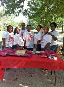 Left to right: Denise Gilchrist, Karlena Butler, Mary Frazier, Lisa Watson, Brenda Gordon, and Bonita Lee. Back row: Jackie Kennion, President of the STHS alumni classes 79-90.