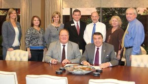 Piedmont Technical College and Lander University recently signed an articulation agreement that will create a bridge program for nursing students who would like to begin their studies at PTC, and then transfer to Lander University. Signing the agreement at a recent ceremony are, front row, from left: Dr. Ray Brooks, president of Piedmont Technical College; and Dr. Daniel Ball, president of Lander University. Back row, from left: Dr. Jennifer Wilbanks, associate vice president for academic affairs at PTC; Paula Haynes, R.N. to B.S.N. coordinator at Lander; Tara Harris, dean of nursing at PTC; Dr. Jack Bagwell, vice president for academic affairs at PTC; Dr. David Mash, vice president for academic affairs at Lander; Dr. Robbie South, director of the School of Nursing at Lander; and Dr. David Slimmer, dean of the College of Science and Mathematics at Lander.