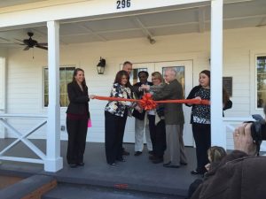 County Council Chairman Genia Blackwell cuts the ribbon at the Merriwether Center