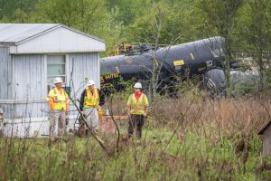 Emergency responders in the yard of Kim and Joni Outlaw at the scene of April 10, 2015 derailment of a Norfolk Southern freight train near Salter's Pond Road in Trenton, S.C. Photo Credit: Robert H. Norris, III/Advertiser Staff