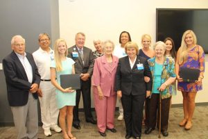 Members of the Mary Ella Ruff and Charlotte Blackwell Memorial Nursing Scholarship committees pose with 2015 scholarship recipients. Pictured front row from left:  recipient, McKenzie Reid, Mary Ella Ruff, Chief Nursing Operator, Linda Russell and Georgia Gillion.  Pictured back row from left: Dr. Travis Stevenson, John Paguntalan, President and CEO, Jim Pfeiffer, Kaye Brock, and recipients Andrill Richard, McKayla Stevenson, Taylor Yonce and Kara Lowery.