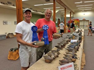 Tim (right) and Marc from Raleigh with the co-carved rig of blue wing teal that took first in marsh ducks and best in show.