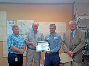 L to R: Don Smoak and Mart Adams, SCE&G; Senior Airman Jonathon McKay of the US Air Force Reserve and SCE&G Apprentice Lineman; Luther K. Beason, ESGR Representative.