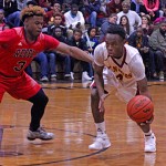 Rod Dobbs #3 reaches in for steal. Photo Bill Hart / The Advertiser