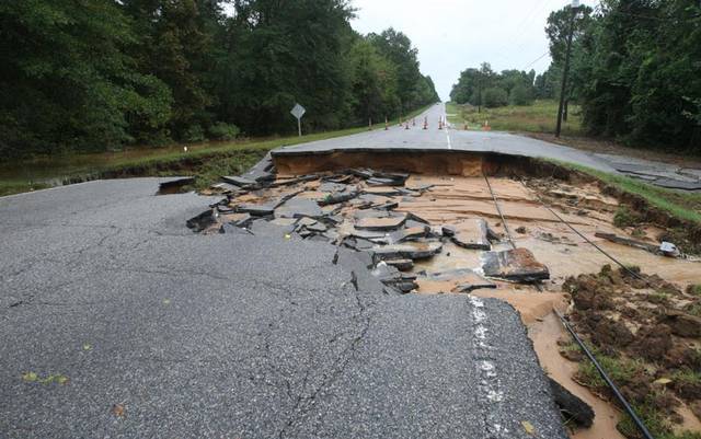 Recent heavy rains and floods caused many roads and small bridges to wash out.  