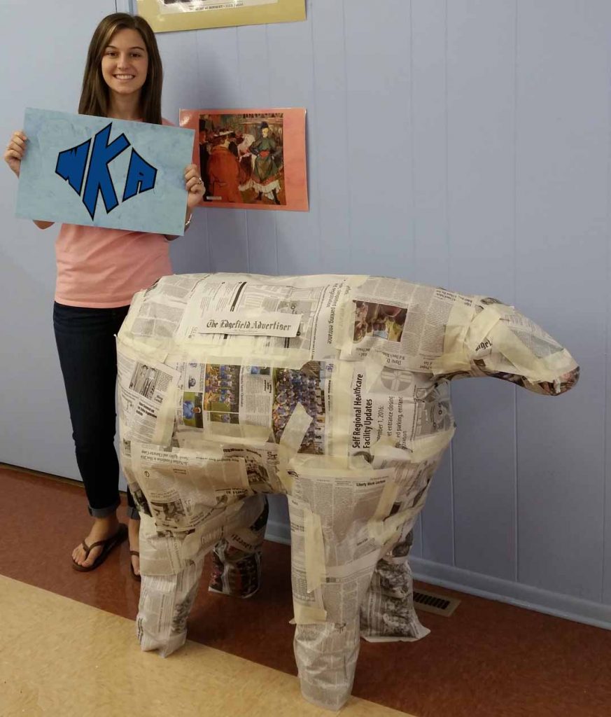 Pictured with the Edgefield Advertiser cow is Peighton Rienzo.