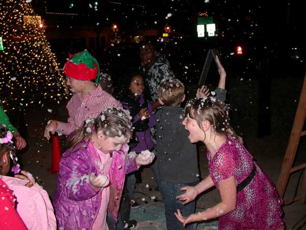 The Johnston Tree Lighting Features Santa and a Cake