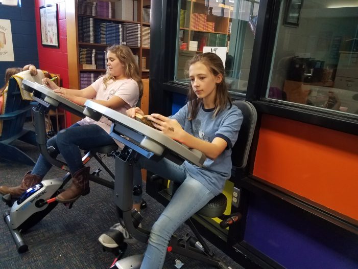 Spinning in the Stacks: J-E-T’s Media Center Adds Exercise Bikes