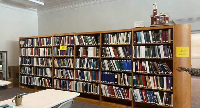 WITH FAMILY BOOKS AND FILES IN CONTENTION <strong>PAST MEETS PRESENT ON COURT HOUSE SQUARE</strong>